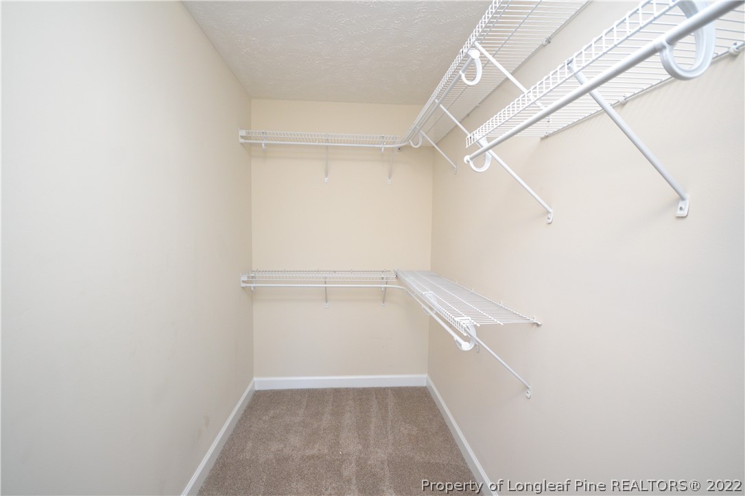 3608 Talus Road Fayetteville, NC 28306 - Photo 30 of 46 a view of an empty walk in closet