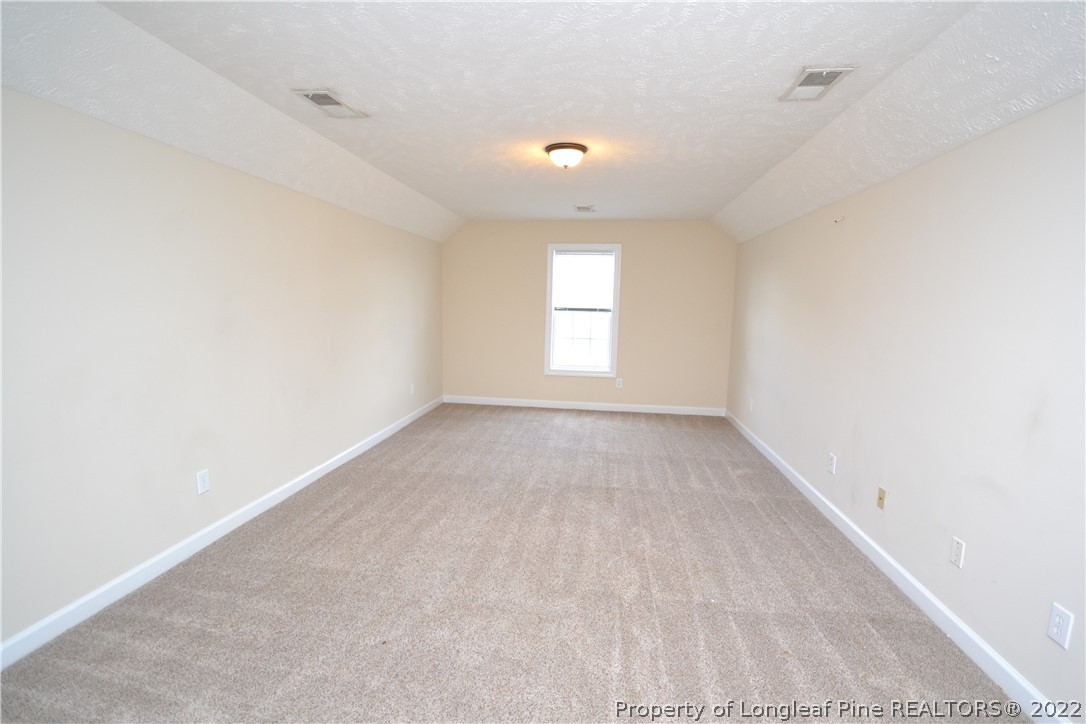 3608 Talus Road Fayetteville, NC 28306 - Photo 37 of 46 an empty room with a window