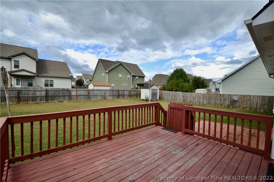 3608 Talus Road Fayetteville, NC 28306 - Photo 40 of 46 a view of balcony with wooden floor and fence