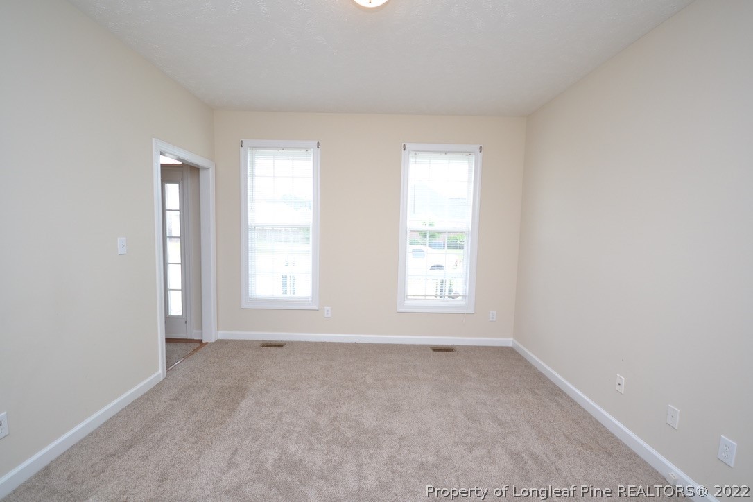 3608 Talus Road Fayetteville, NC 28306 - Photo 5 of 46 an empty room with a window