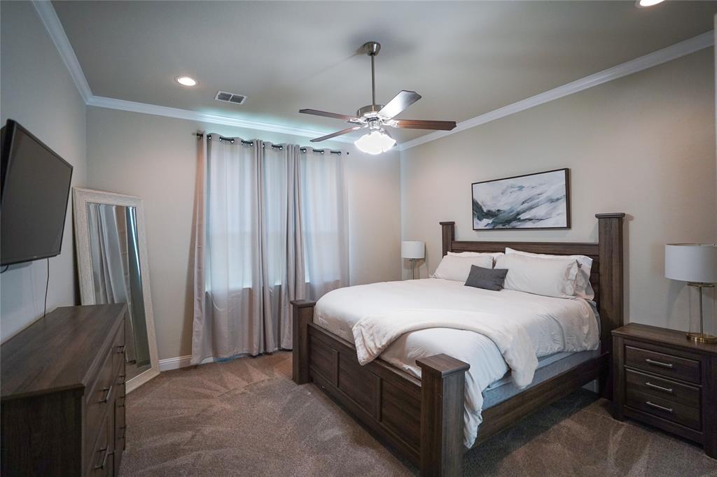 3009 Treasure View Drive Decatur, TX 76234 - Photo 12 of 26 Bedroom with ornamental molding, dark carpet, a ceiling fan, and recessed lighting