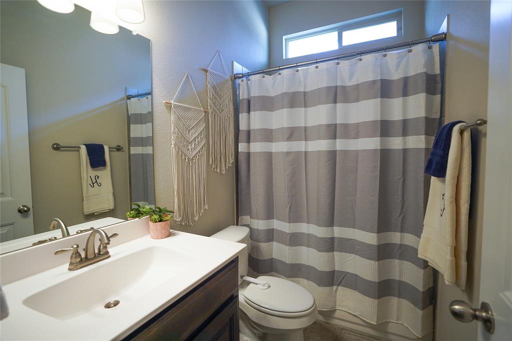 3009 Treasure View Drive Decatur, TX 76234 - Photo 20 of 26 Full bathroom featuring vanity and toilet