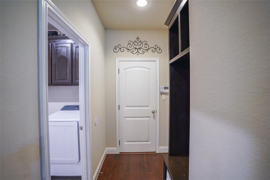 3009 Treasure View Drive Decatur, TX 76234 - Photo 22 of 26 entry from garage with laundry room access, and storage