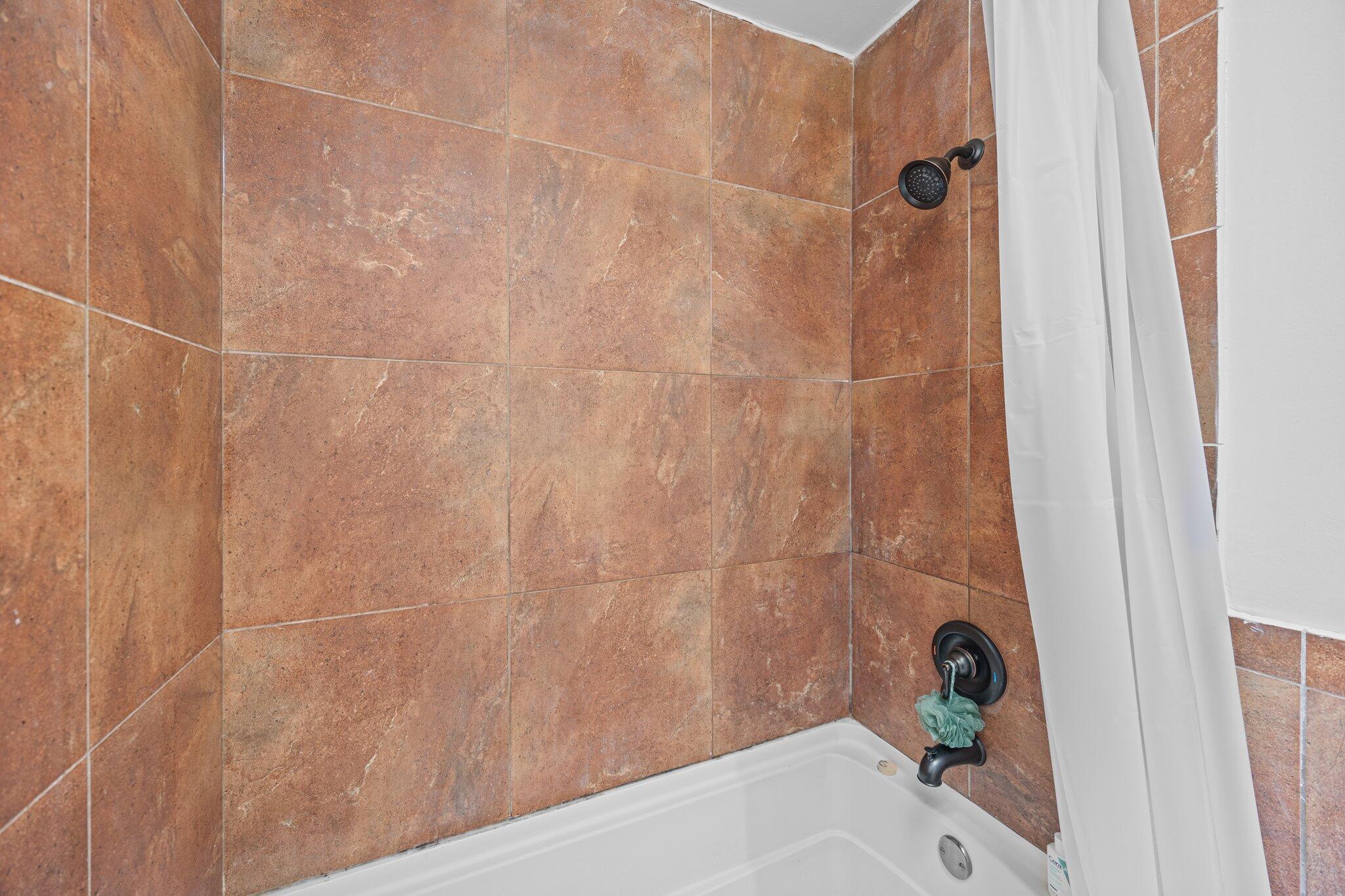 11 America Street Charleston, SC 29403 - Photo 22 of 27 Upstairs Bathroom- Bathtub and Shower