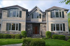 8 Hollow Tree Road Briarcliff Manor, NY 10510 - Photo 1 of 1 a front view of a house with a yard