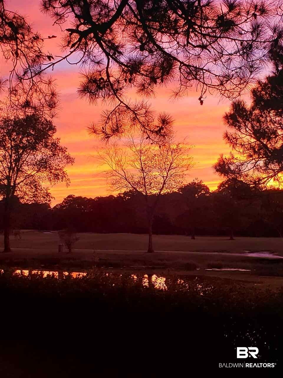 1701 Regency Road, Unit 118 Gulf Shores, AL 36542 - Photo 48 of 50 Sunset Over Golf Course