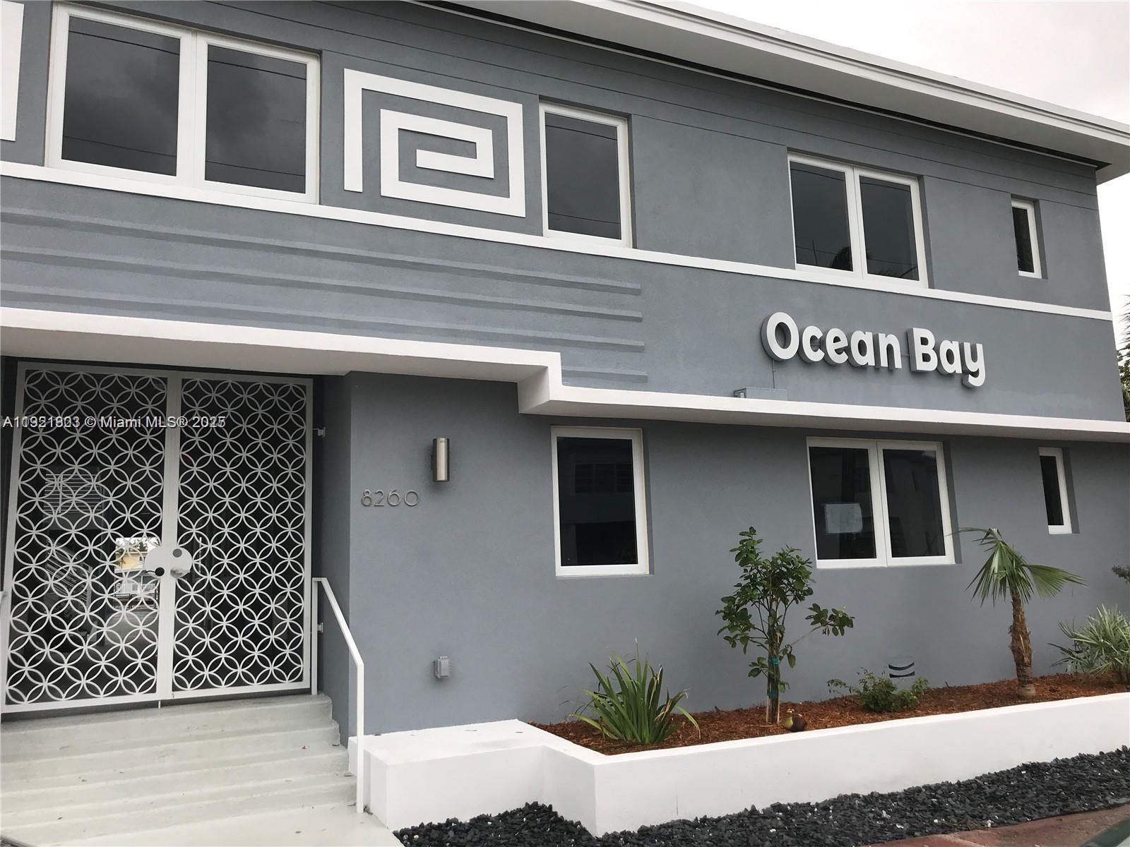 8260 Byron Avenue, Unit 13 Miami Beach, FL 33141 - Photo 1 of 5 a view of a house with entrance door