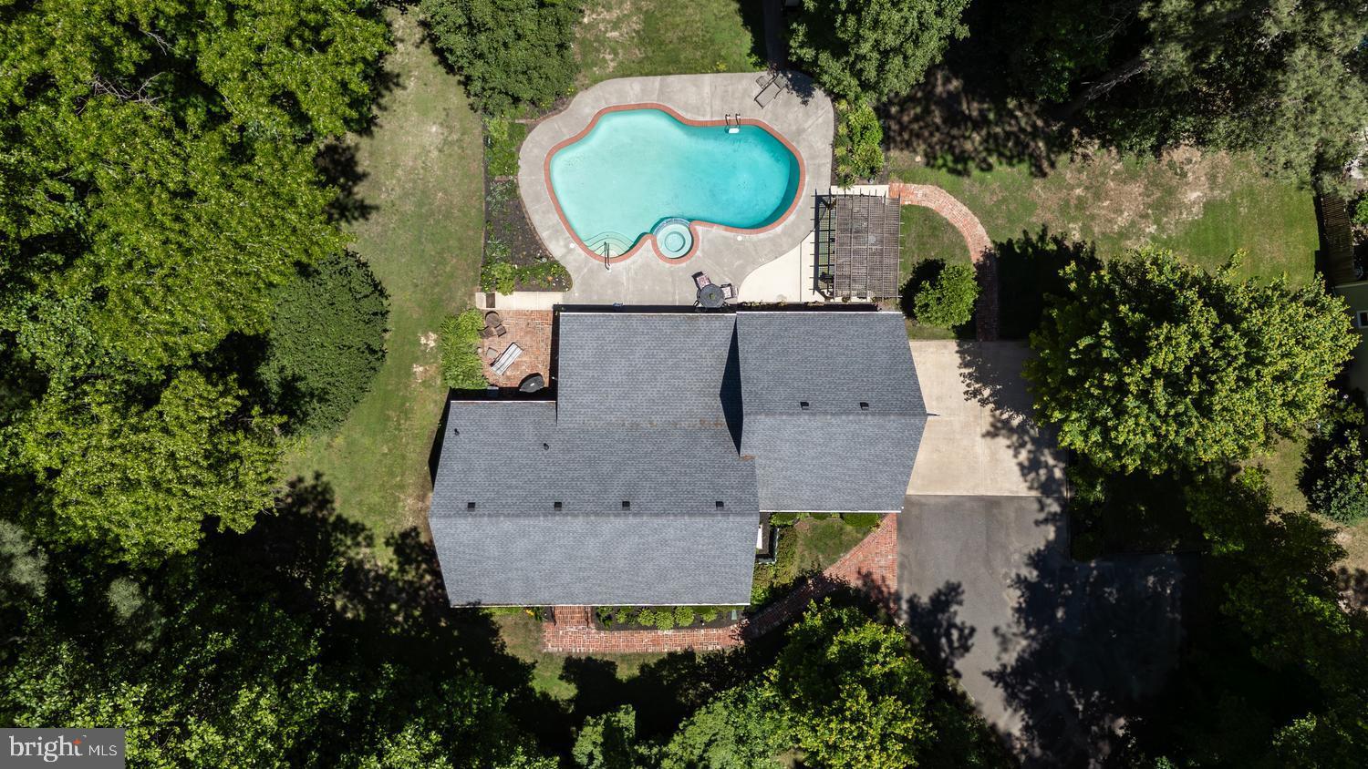 814 Wrights Neck Road Centreville, MD 21617 - Photo 23 of 53 an aerial view of a house with a swimming pool
