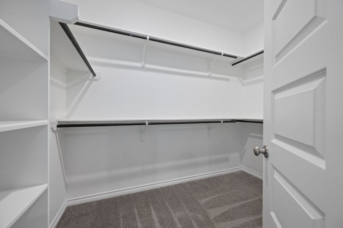 1037 Thunderhead Trail Georgetown, TX 78628 - Photo 17 of 33 a bathroom with a shower and a bath tub