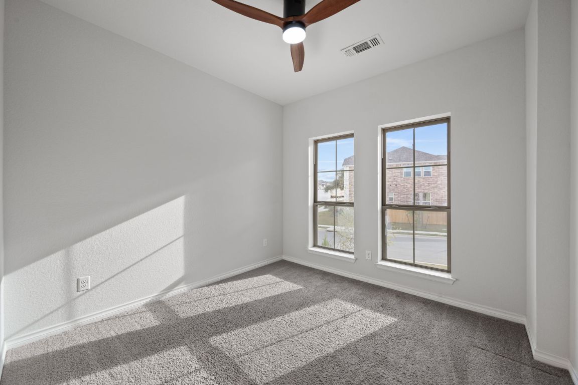 1037 Thunderhead Trail Georgetown, TX 78628 - Photo 18 of 33 an empty room with windows