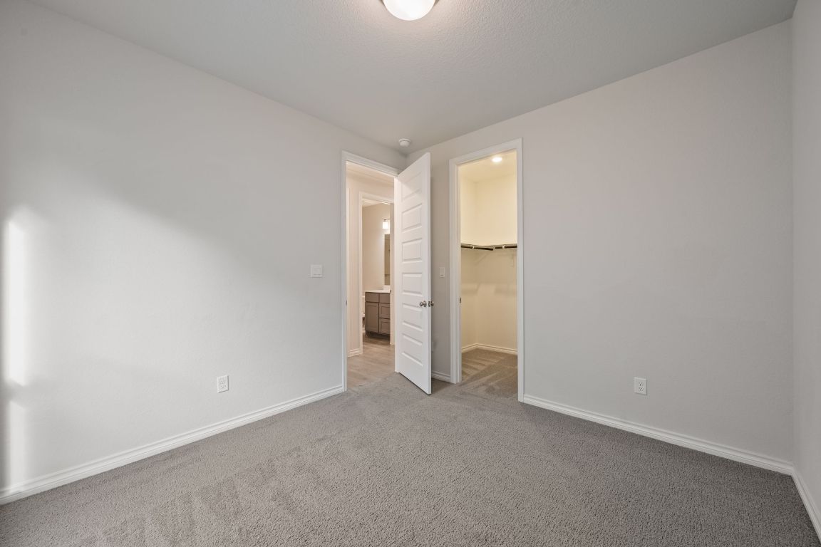 1037 Thunderhead Trail Georgetown, TX 78628 - Photo 22 of 33 a view of an empty room