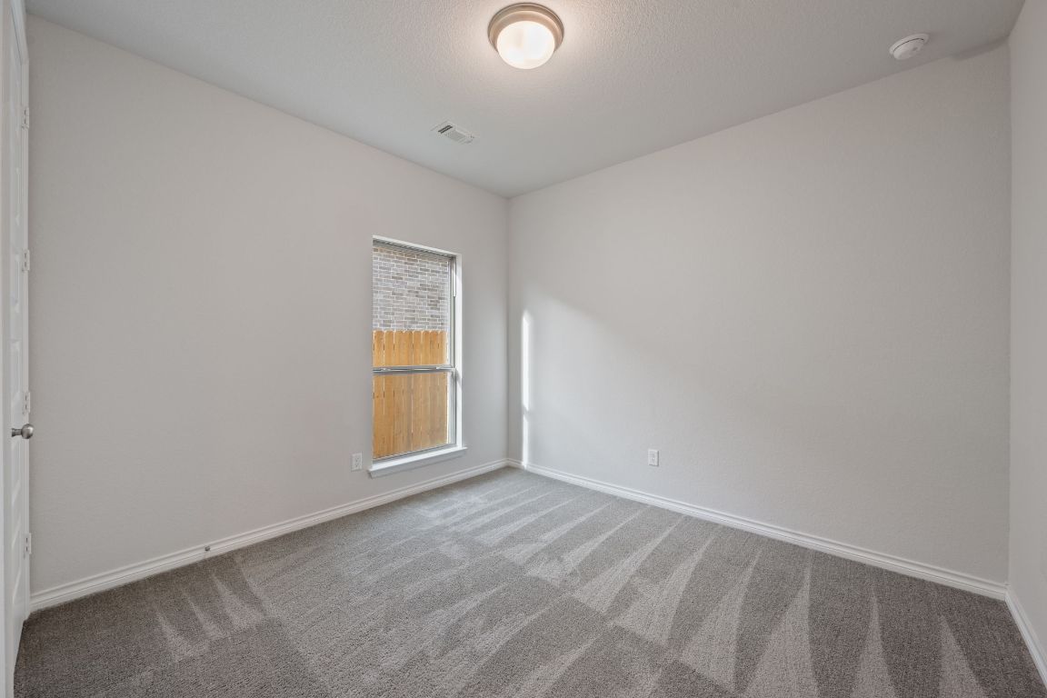 1037 Thunderhead Trail Georgetown, TX 78628 - Photo 24 of 33 a view of an empty room