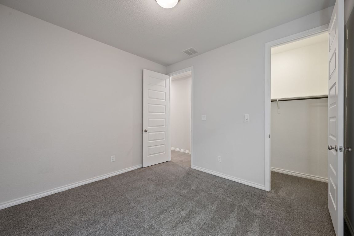 1037 Thunderhead Trail Georgetown, TX 78628 - Photo 25 of 33 a view of an empty room