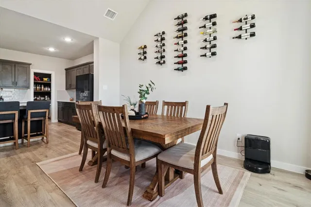 a view of a dining room with furniture