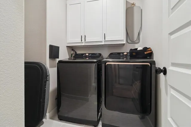 a view of a garage with a bike and storage