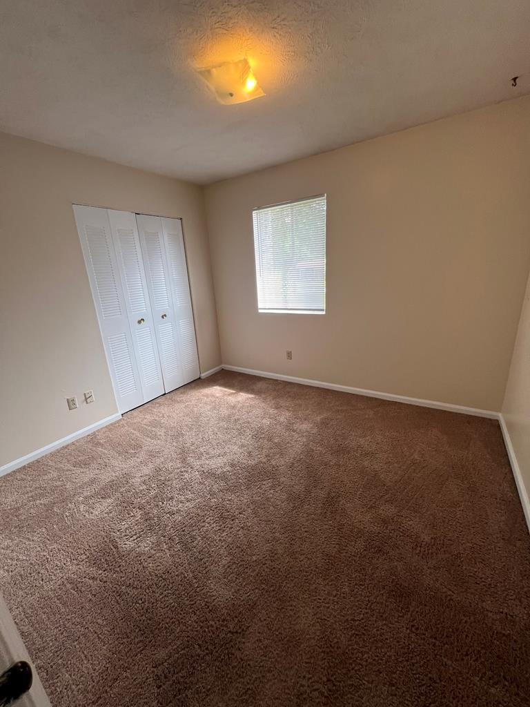 6323 Old Post Court Columbus, GA 31909 - Photo 9 of 13 a view of an empty room with a window