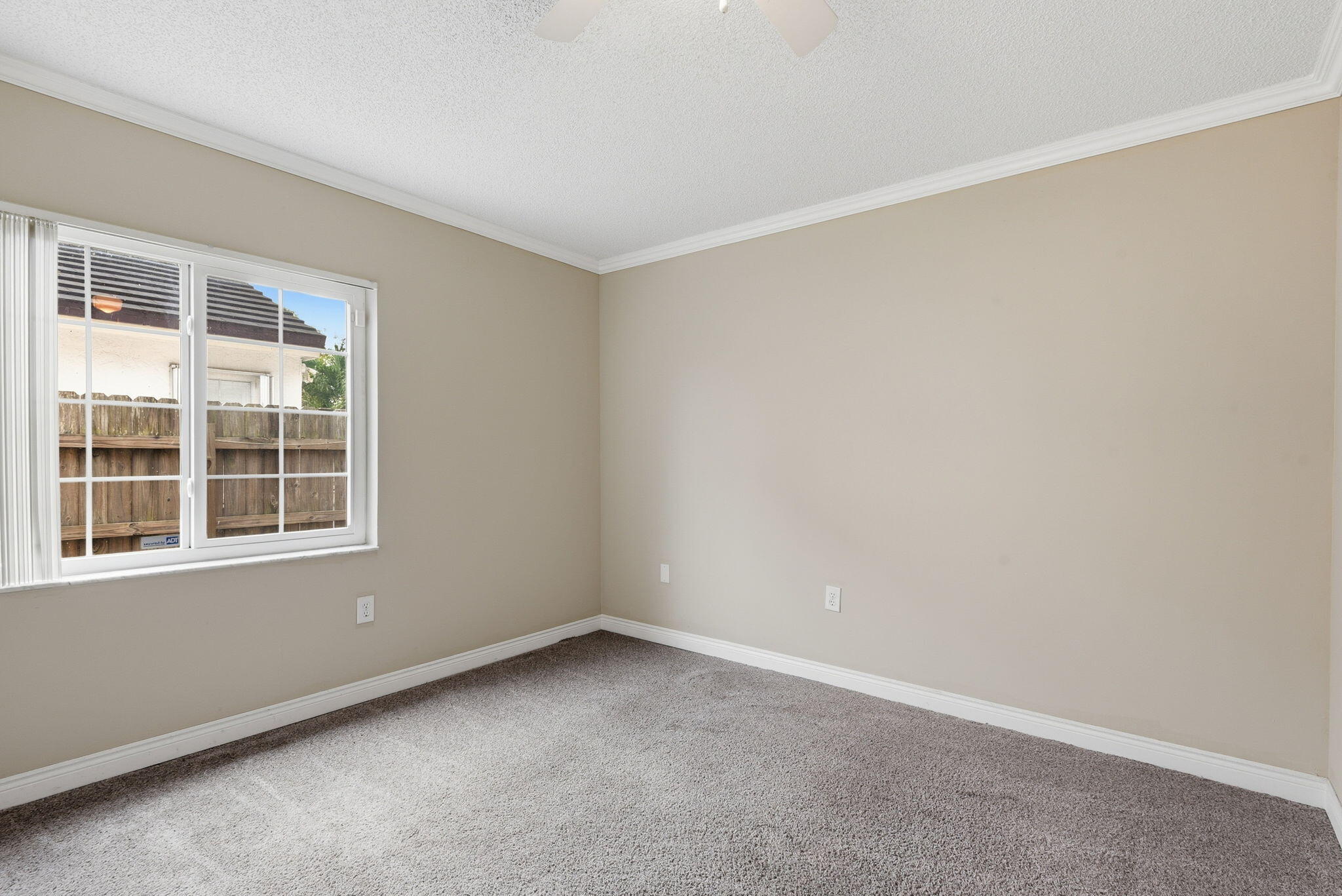 7350 Southwest 161st Place Miami, FL 33193 - Photo 16 of 31 an empty room with a window