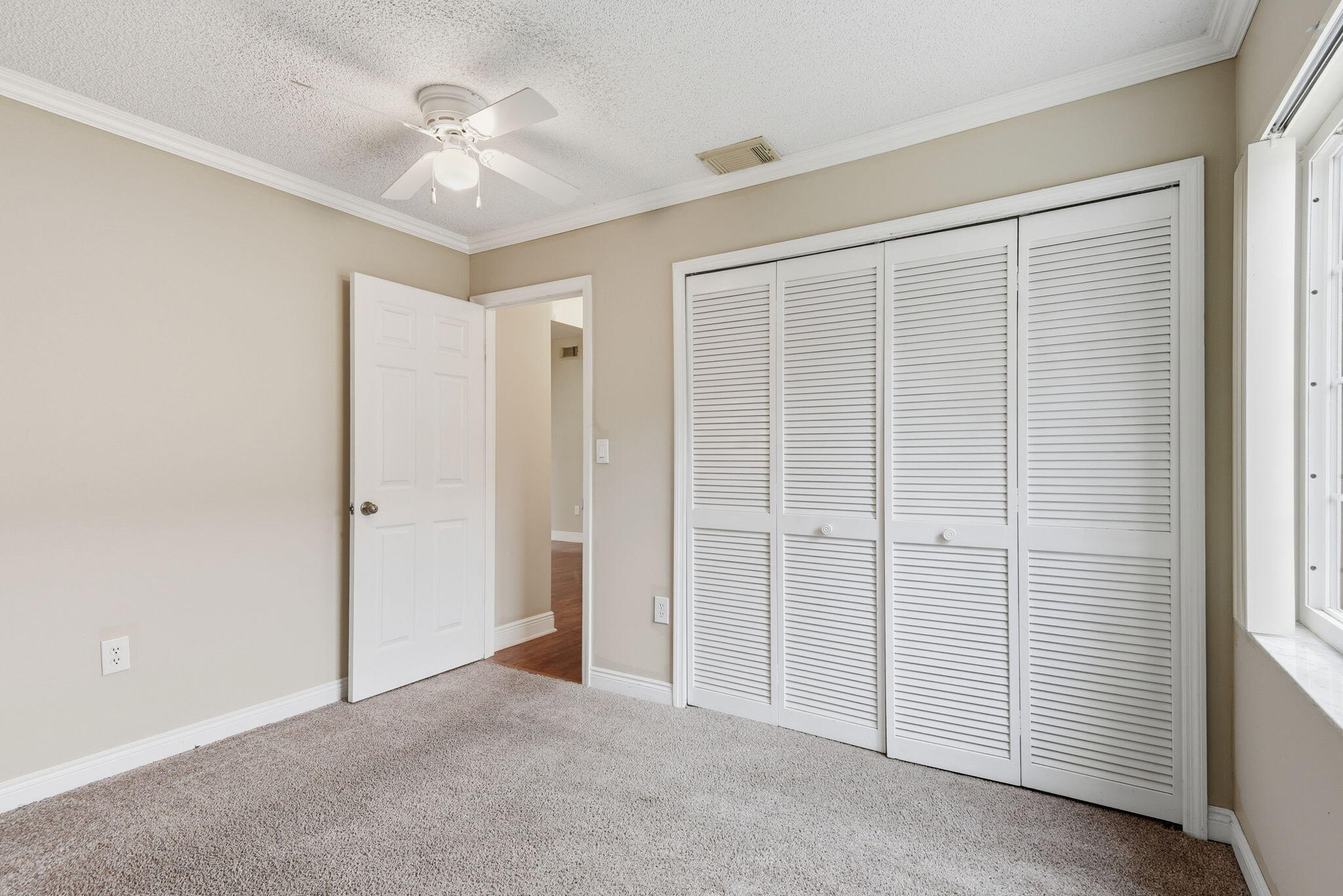 7350 Southwest 161st Place Miami, FL 33193 - Photo 17 of 31 an empty room with a ceiling fan