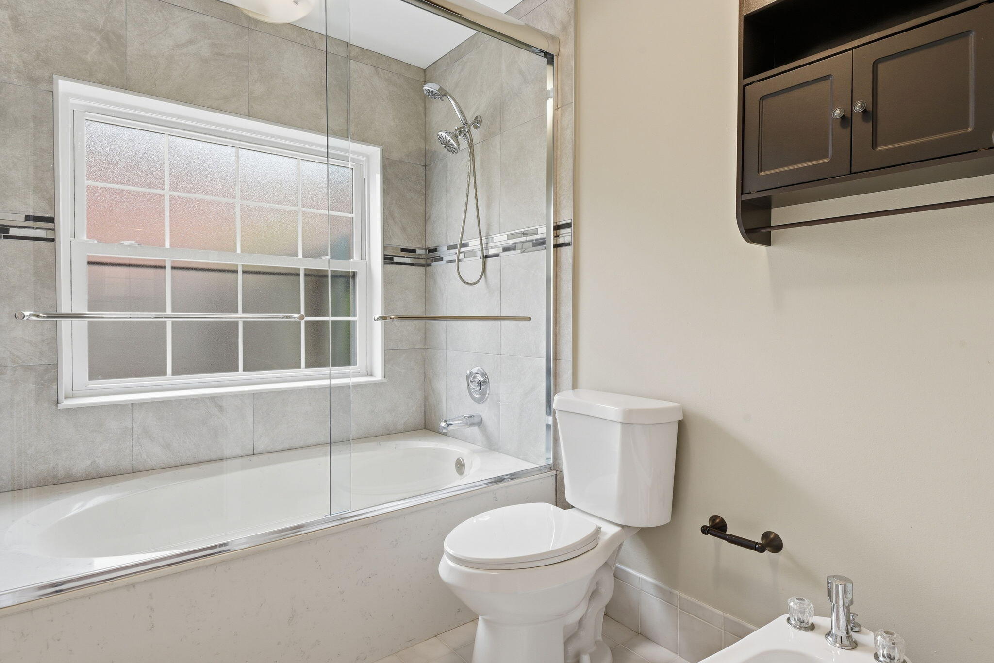 7350 Southwest 161st Place Miami, FL 33193 - Photo 22 of 31 a bathroom with a toilet and a shower