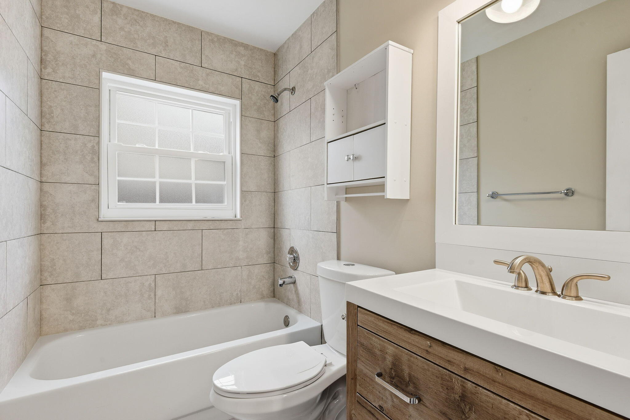 7350 Southwest 161st Place Miami, FL 33193 - Photo 24 of 31 a bathroom with a sink mirror toilet and bathtub