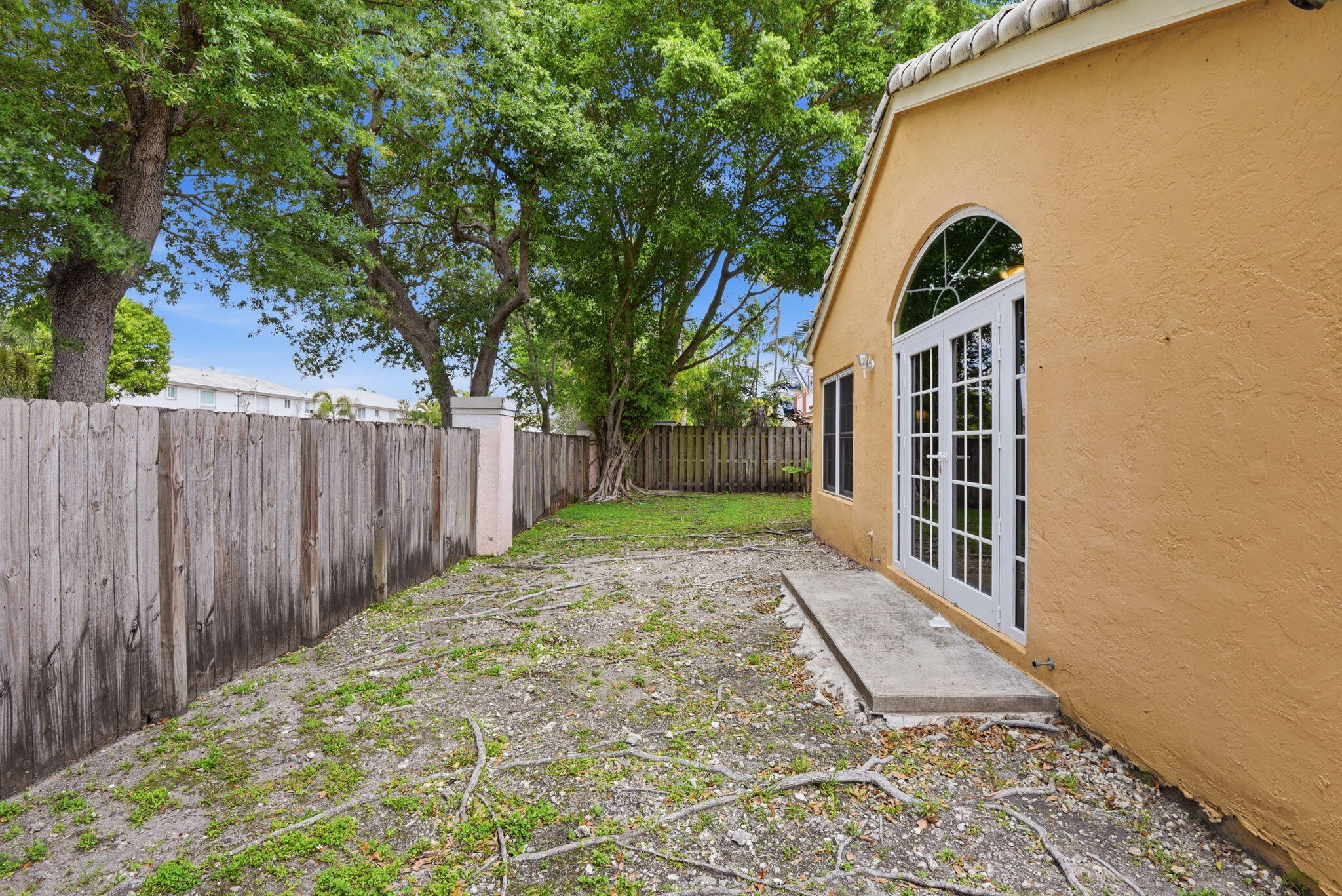 7350 Southwest 161st Place Miami, FL 33193 - Photo 28 of 31 a front view of a house with a garden