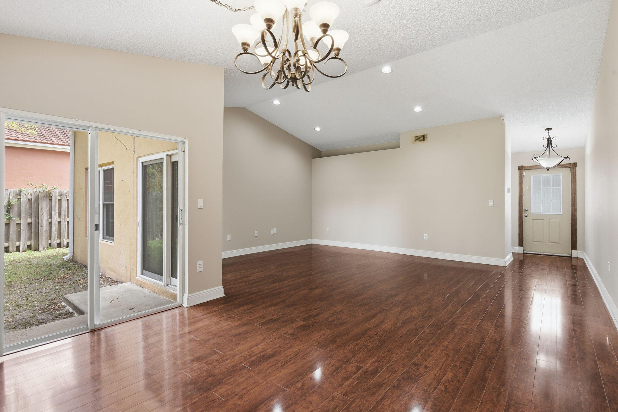 7350 Southwest 161st Place Miami, FL 33193 - Photo 3 of 31 a view of an empty room and wooden floor