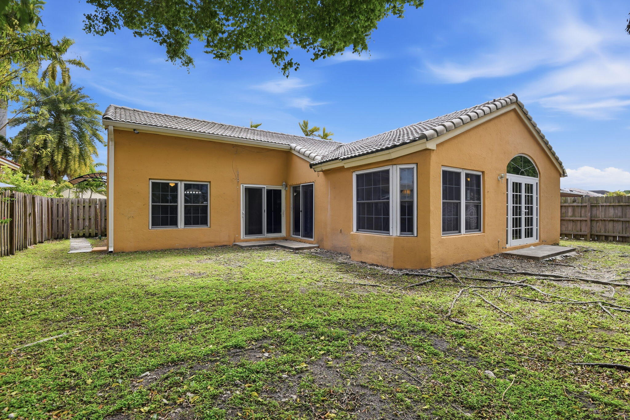 7350 Southwest 161st Place Miami, FL 33193 - Photo 31 of 31 a view of a house with a house in the background