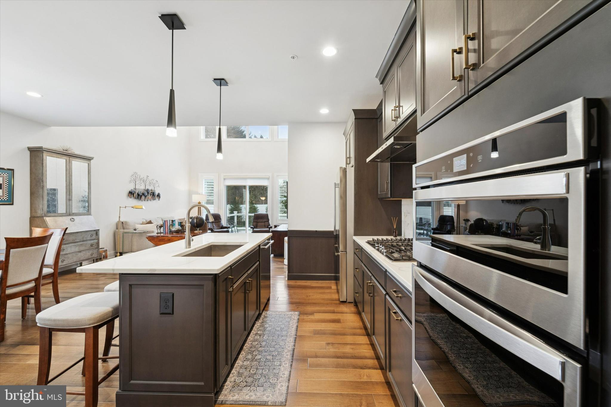 658 Levering Street Blue Bell, PA 19422 - Photo 11 of 38 a kitchen with stainless steel appliances granite countertop a sink and stove