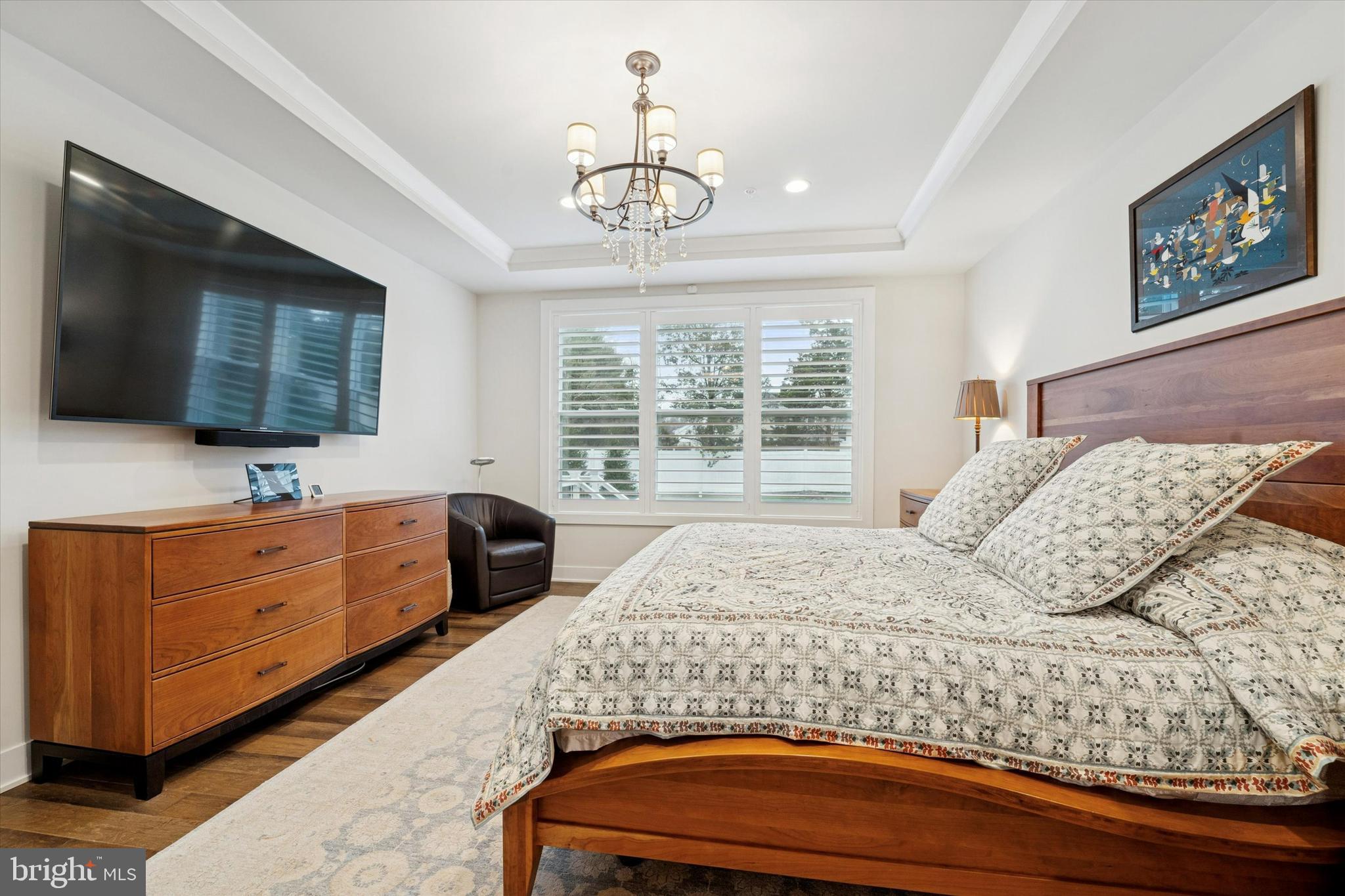658 Levering Street Blue Bell, PA 19422 - Photo 17 of 38 a bedroom with a large bed and a flat tv screen on dresser