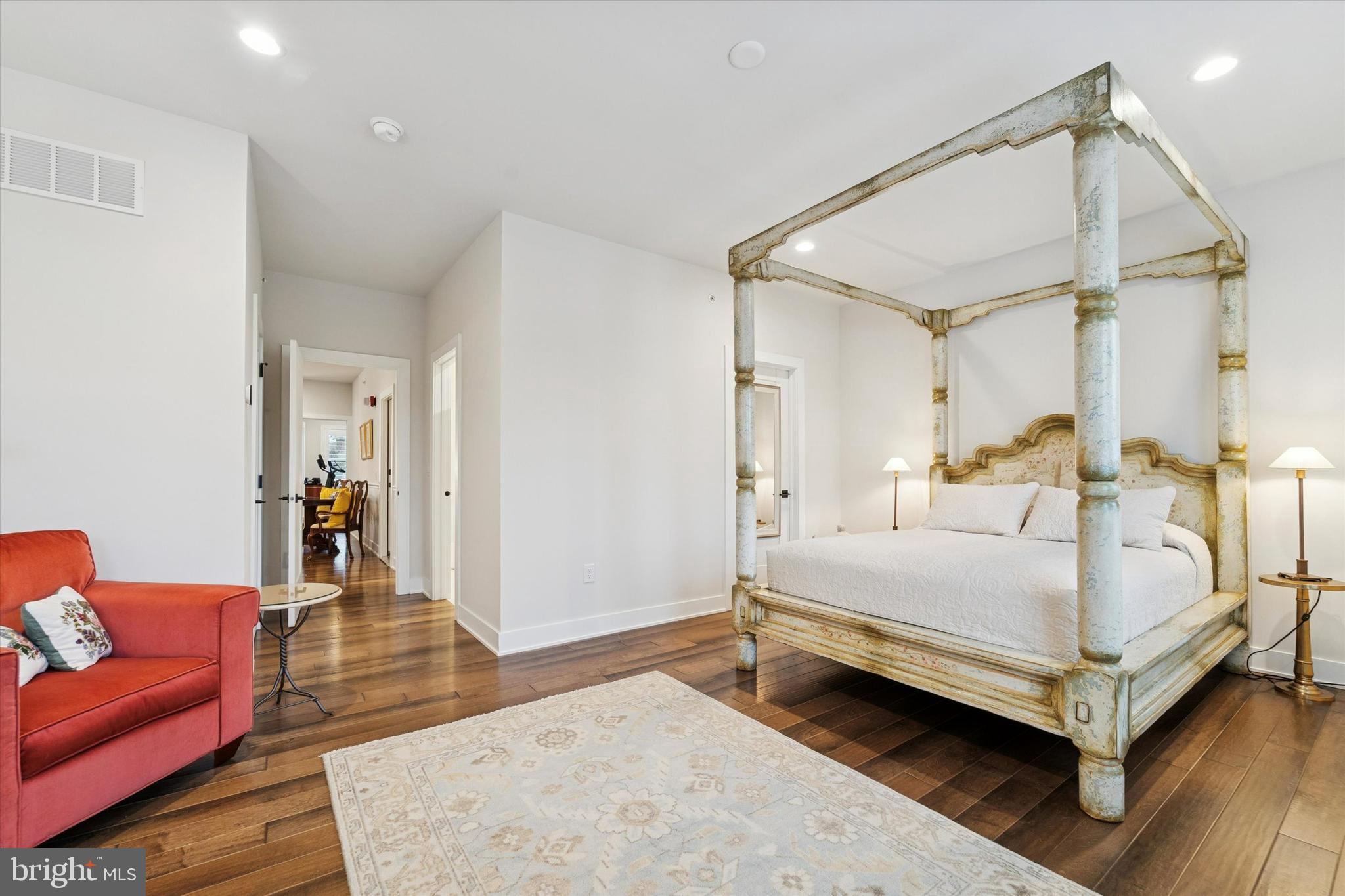 658 Levering Street Blue Bell, PA 19422 - Photo 24 of 38 a spacious bedroom with a bed and a couch