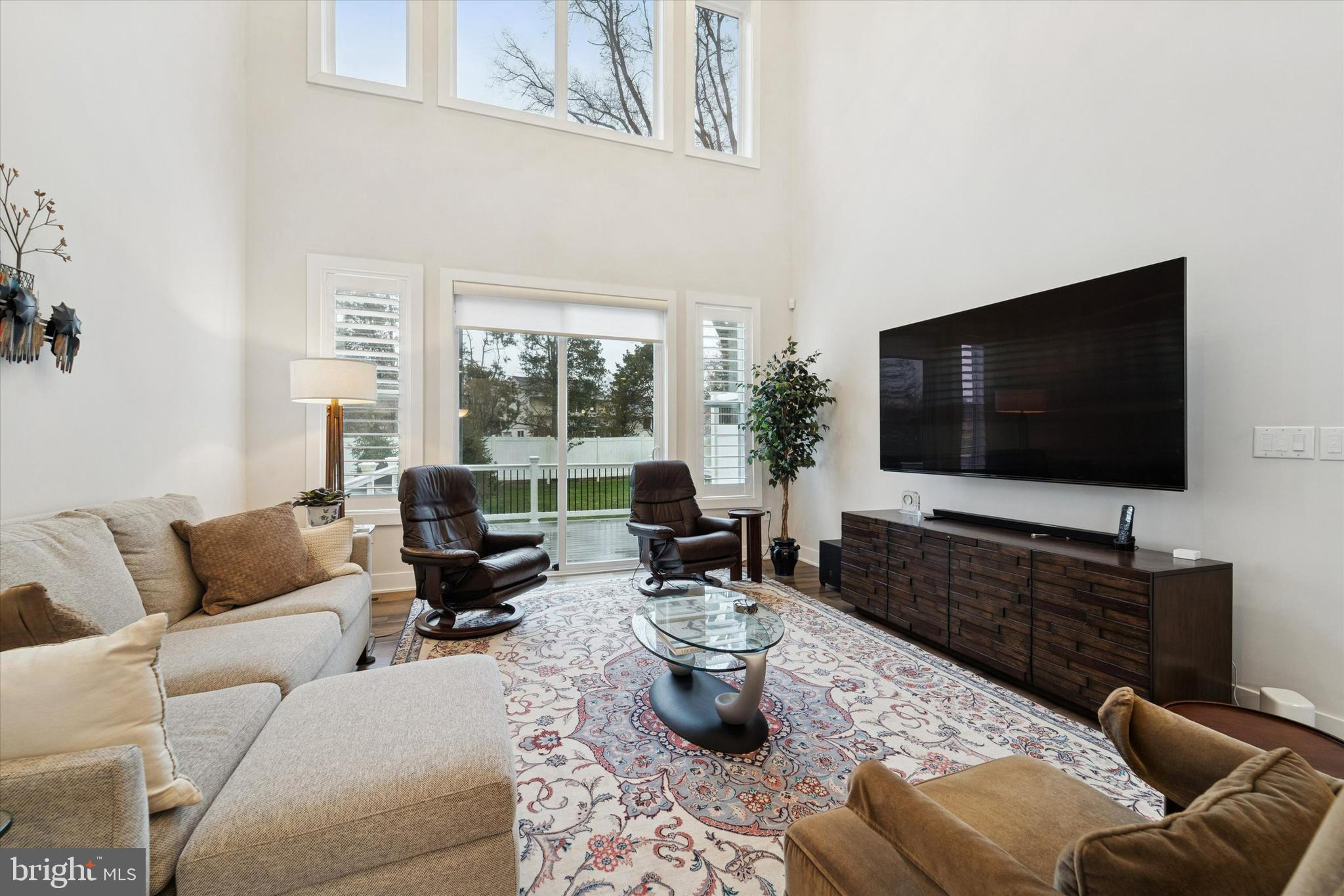 658 Levering Street Blue Bell, PA 19422 - Photo 4 of 38 a living room with furniture and a flat screen tv