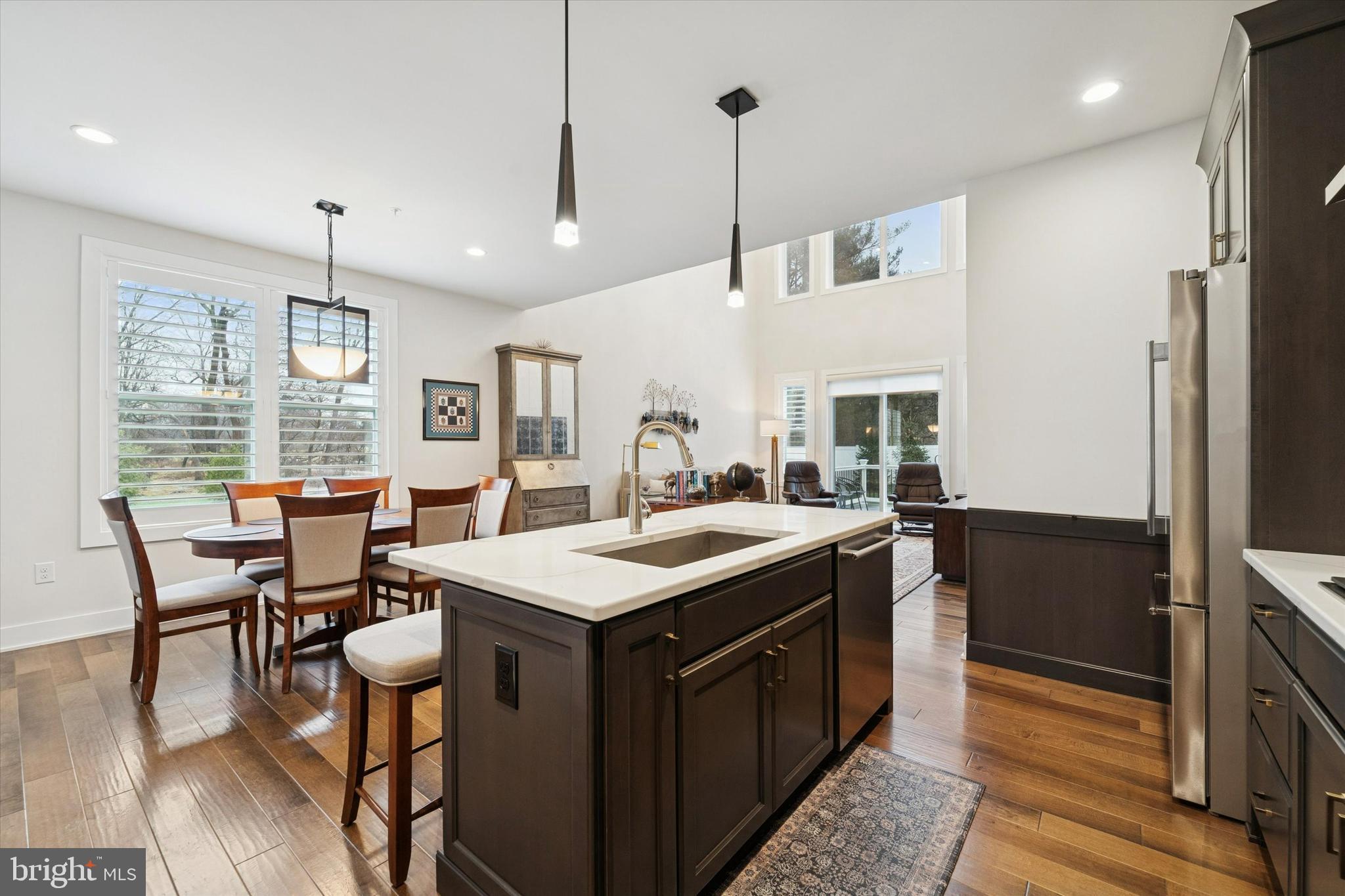 658 Levering Street Blue Bell, PA 19422 - Photo 8 of 38 an open kitchen with a table and chairs