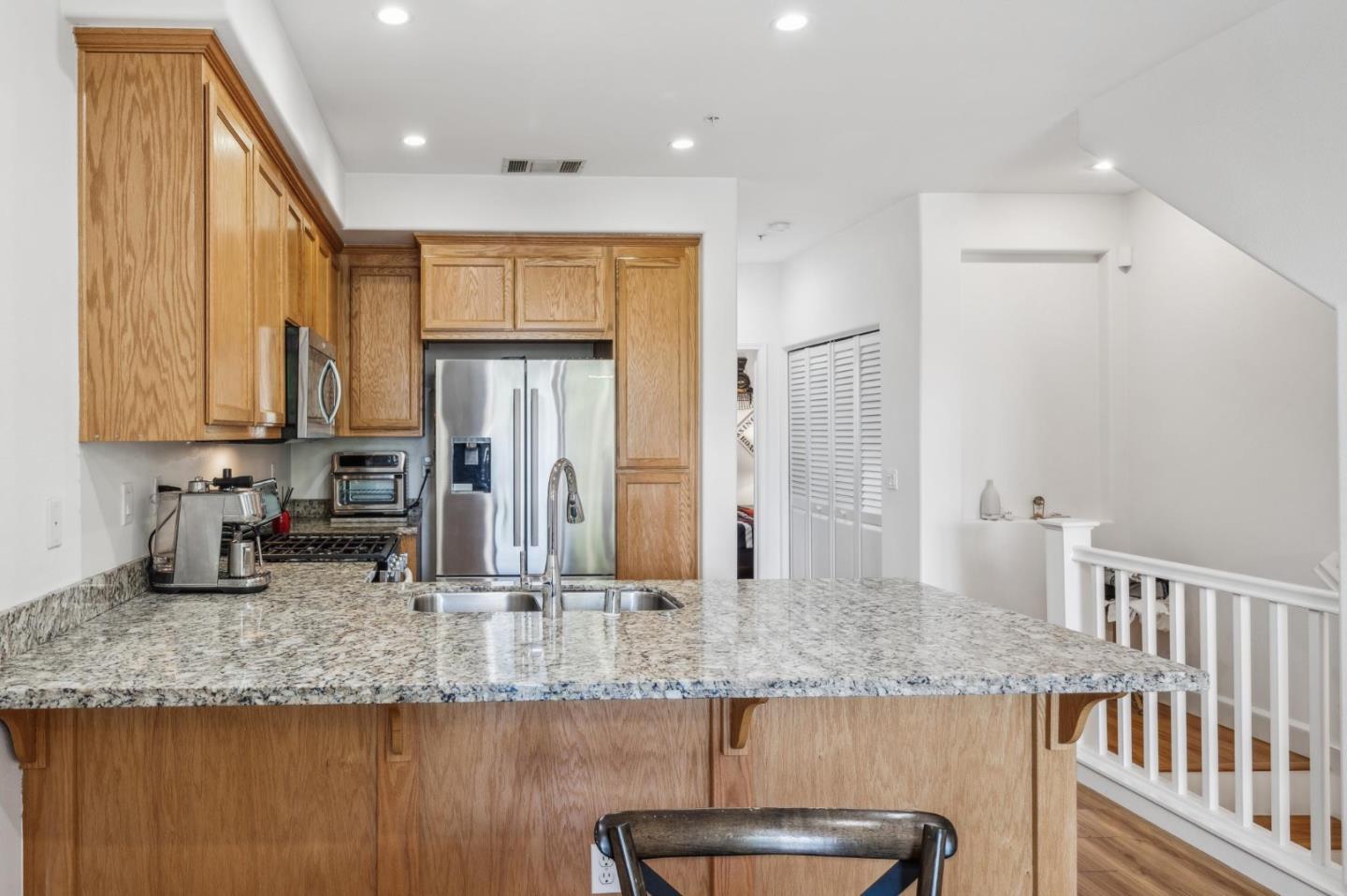 25478 Huntwood Avenue Hayward, CA 94544 - Photo 12 of 35 a kitchen with counter top space cabinets and stainless steel appliances