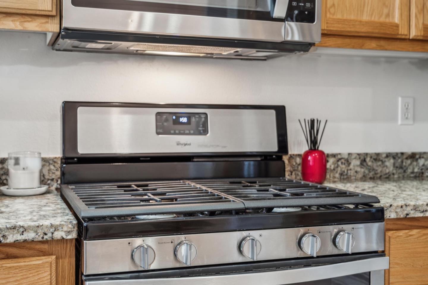 25478 Huntwood Avenue Hayward, CA 94544 - Photo 15 of 35 a stove top oven sitting inside of a kitchen