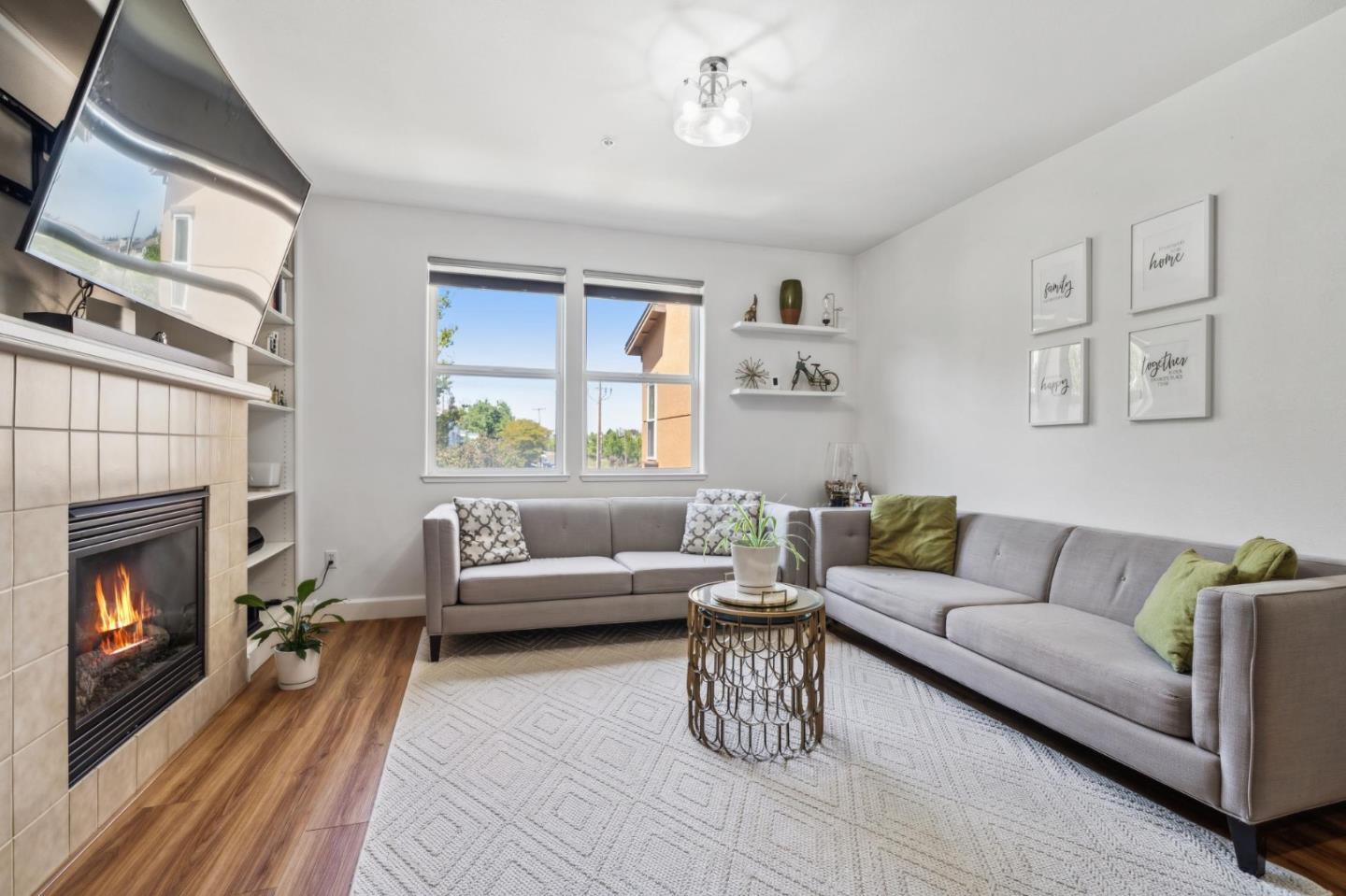 25478 Huntwood Avenue Hayward, CA 94544 - Photo 3 of 35 a living room with furniture and a fireplace
