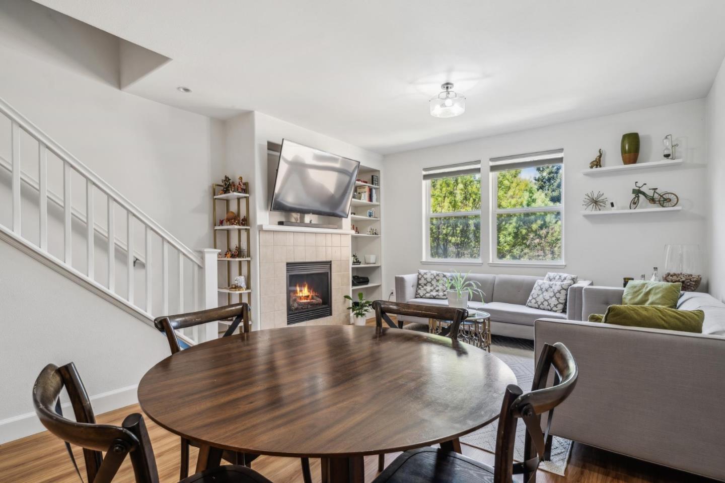 25478 Huntwood Avenue Hayward, CA 94544 - Photo 8 of 35 a living room with furniture a fireplace and a flat screen tv