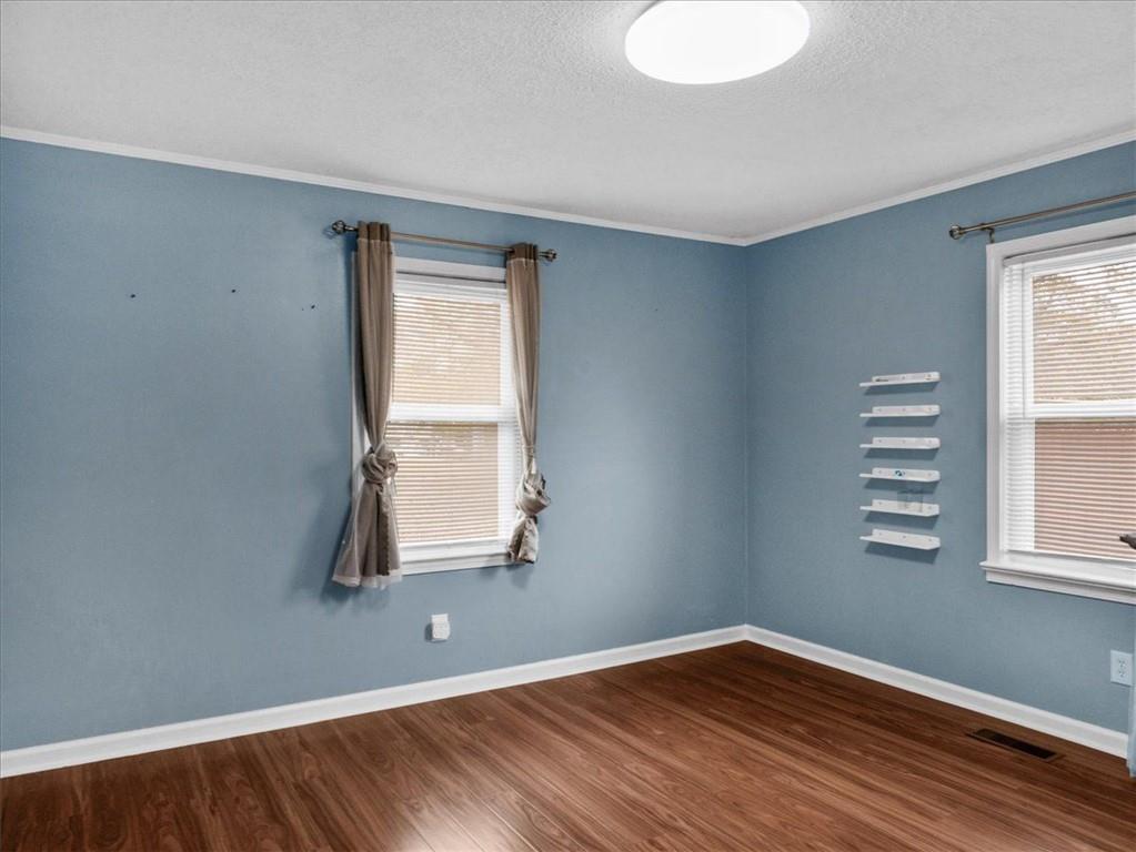 1115 Ila Road Commerce, GA 30530 - Photo 19 of 38 an empty room with windows