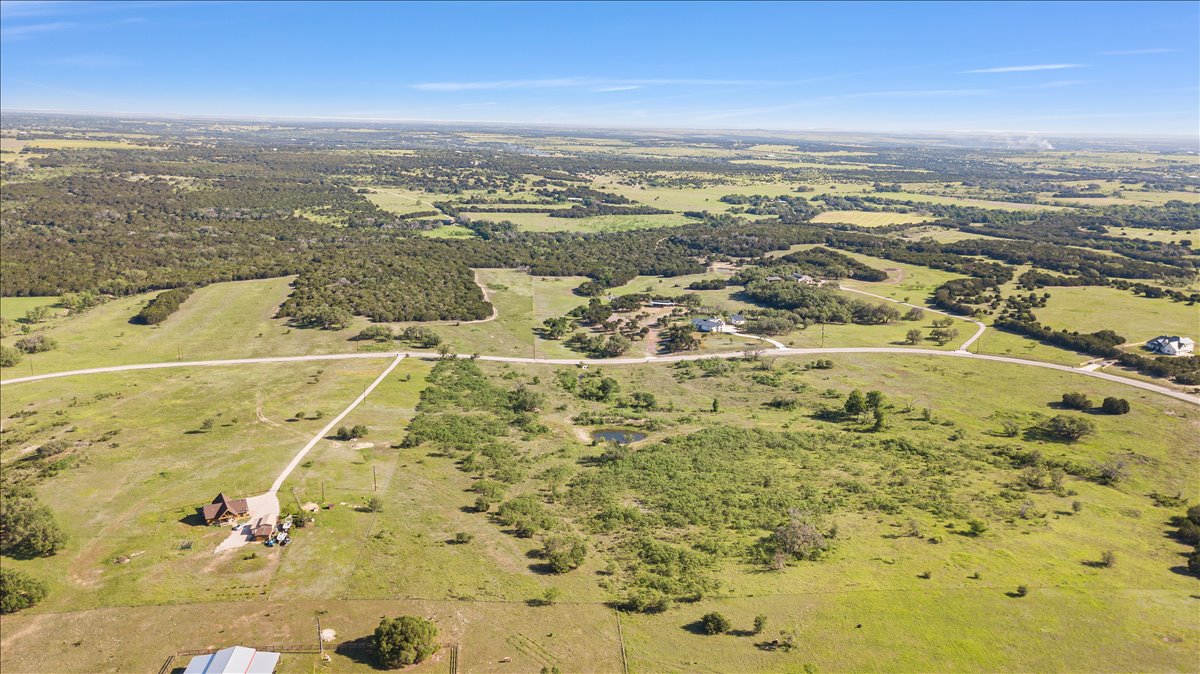 Lot 104 Carpenter Loop Burnet, TX 78611 - Photo 8 of 28 an aerial view of residential houses with outdoor space