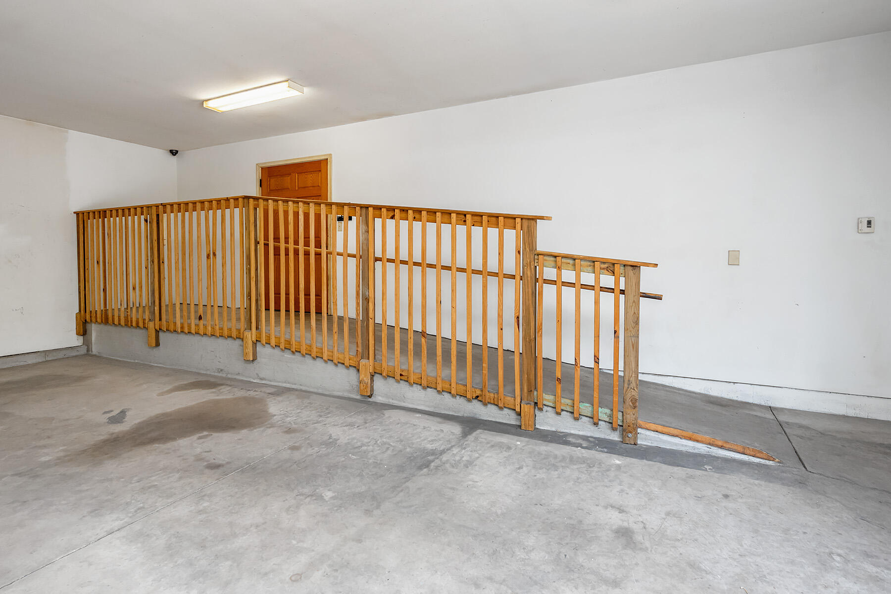W303S10481 Sandy Beach Road Mukwonago, WI 53149 - Photo 63 of 74 Garage Entrance ADA ramp
