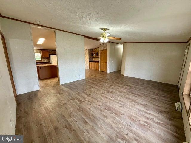 192 Northern Pine Road Hopewell, PA 16650 - Photo 11 of 66 wooden floor in an empty room with a window