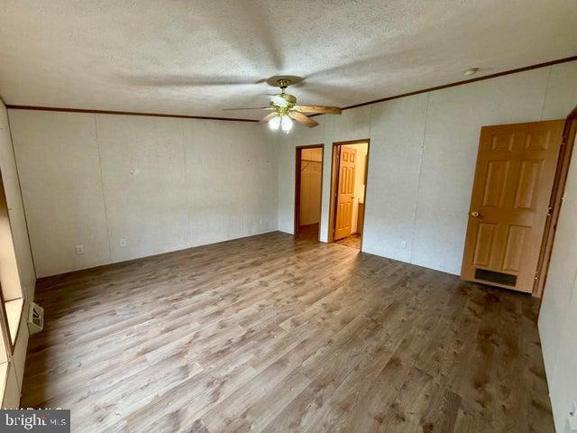 192 Northern Pine Road Hopewell, PA 16650 - Photo 16 of 66 a view of an empty room with a ceiling fan