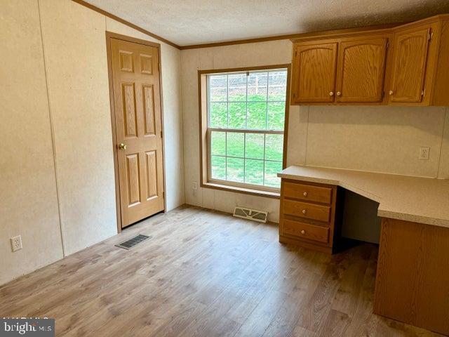 192 Northern Pine Road Hopewell, PA 16650 - Photo 27 of 66 a view of an empty room with a window and wooden floor