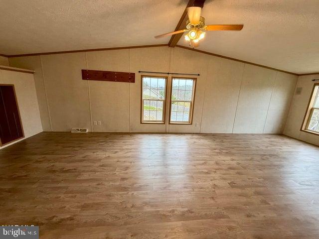 192 Northern Pine Road Hopewell, PA 16650 - Photo 34 of 66 a view of room with window and wooden floor