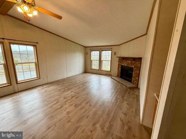 192 Northern Pine Road Hopewell, PA 16650 - Photo 35 of 66 a view of an empty room with a fireplace and a window