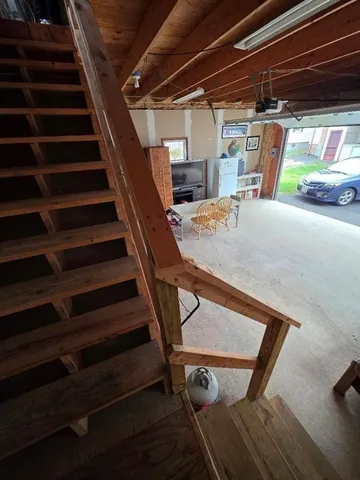 a view of a chairs and table in a patio
