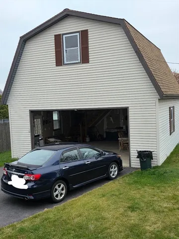 a car parked in front of a house