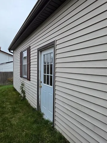 a view of backyard of house