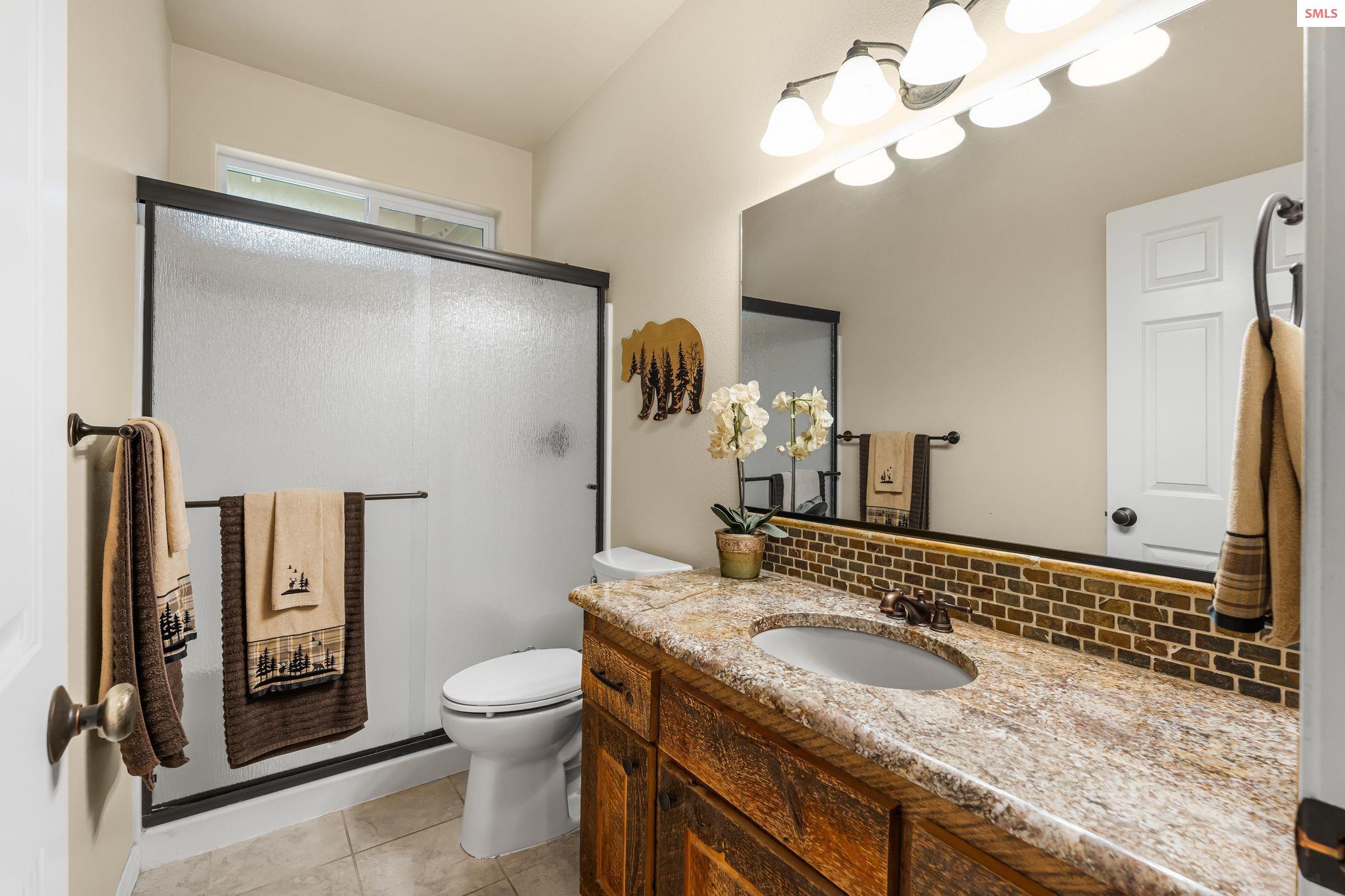 31957 North Wester Ranch Road Athol, ID 83801 - Photo 37 of 66 Guest bathroom with a shower