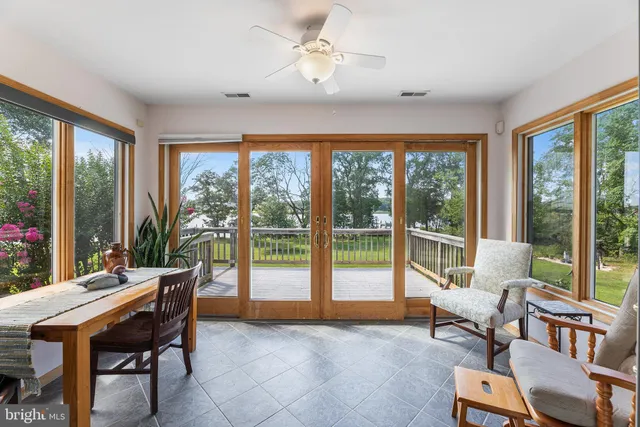 a view of a livingroom with furniture and a work space