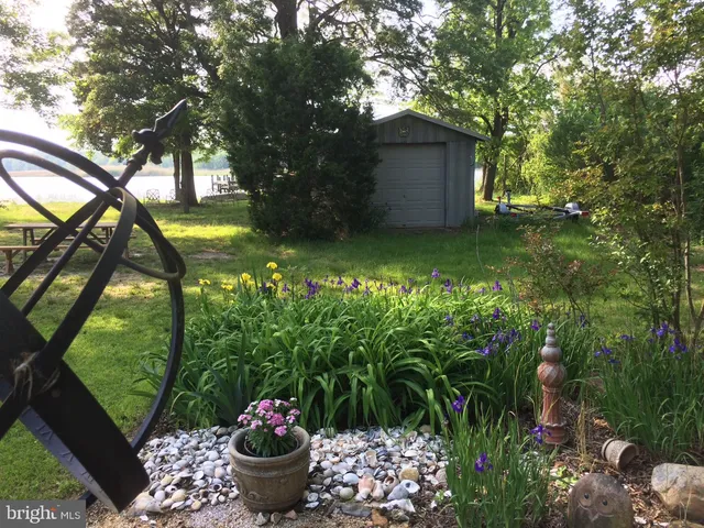 a view of a street with a building in the background
